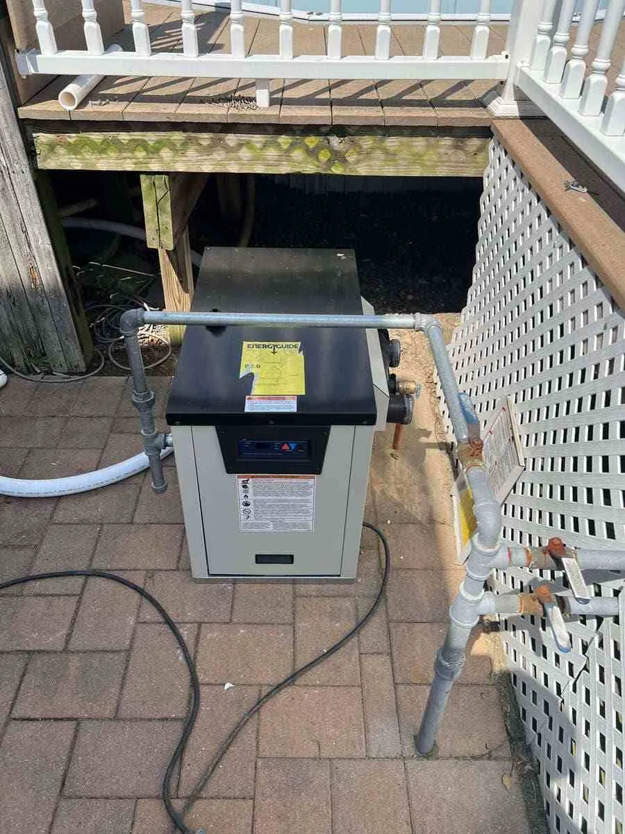 Heating system components being evaluated during boiler repair service in Massapequa, NY. Boiler repair near me