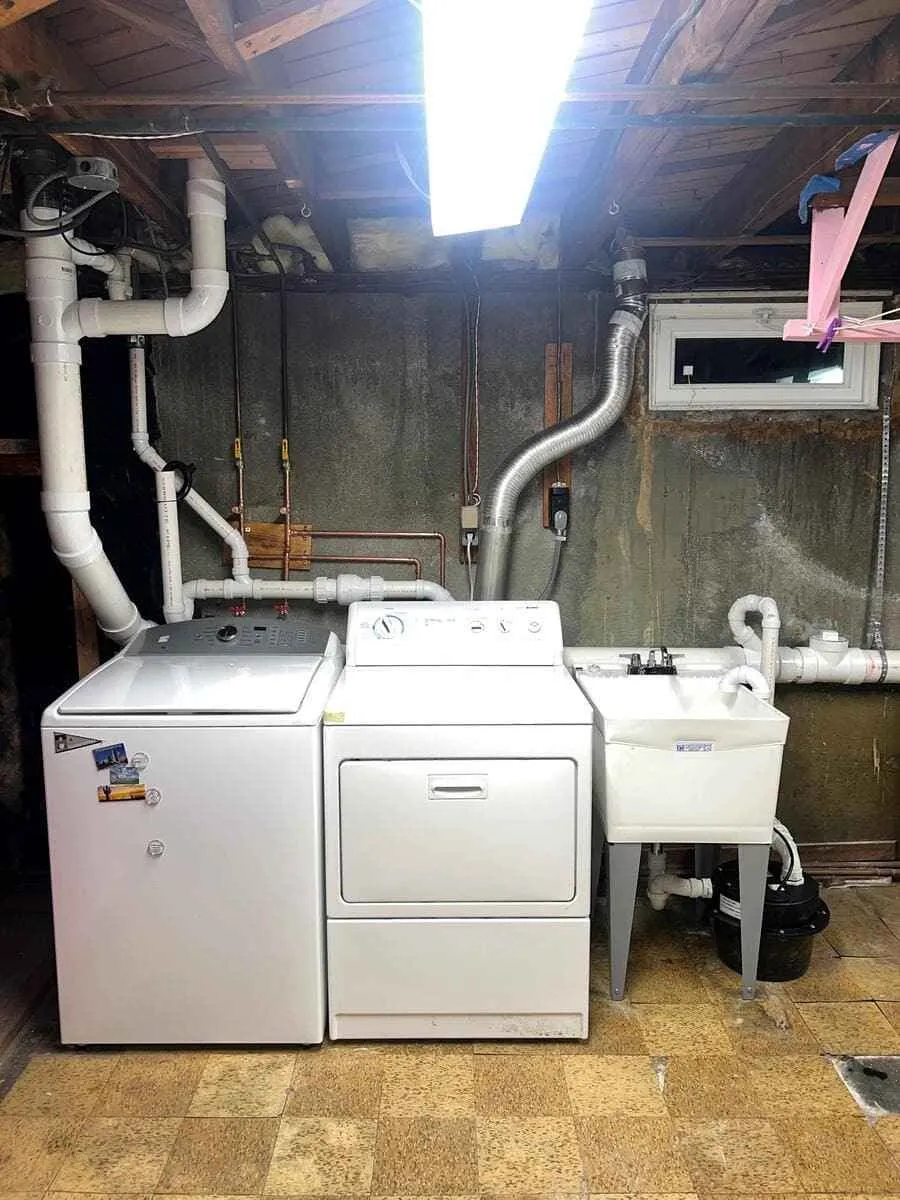 Radiator being checked after remaining cold while the boiler operates in Seaford, NY.
