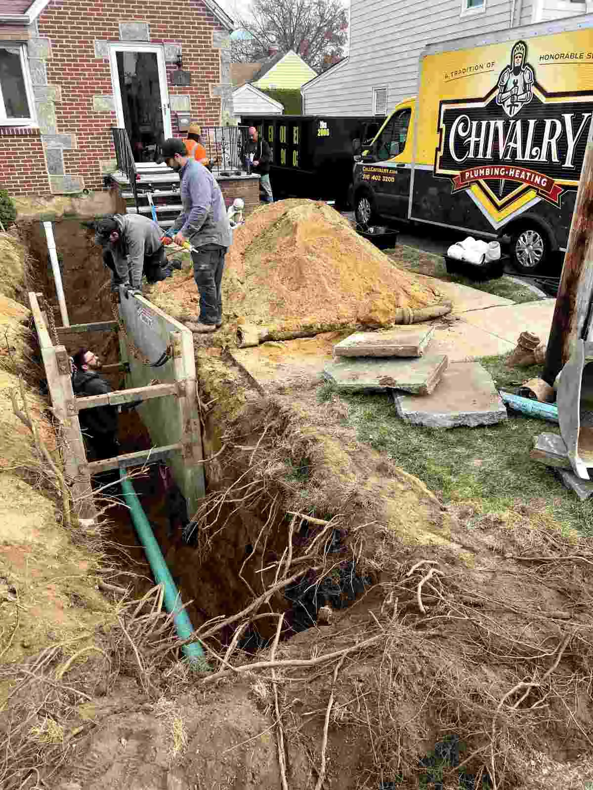 Damaged plumbing pipe and leaking connection being examined in West Islip, NY.
