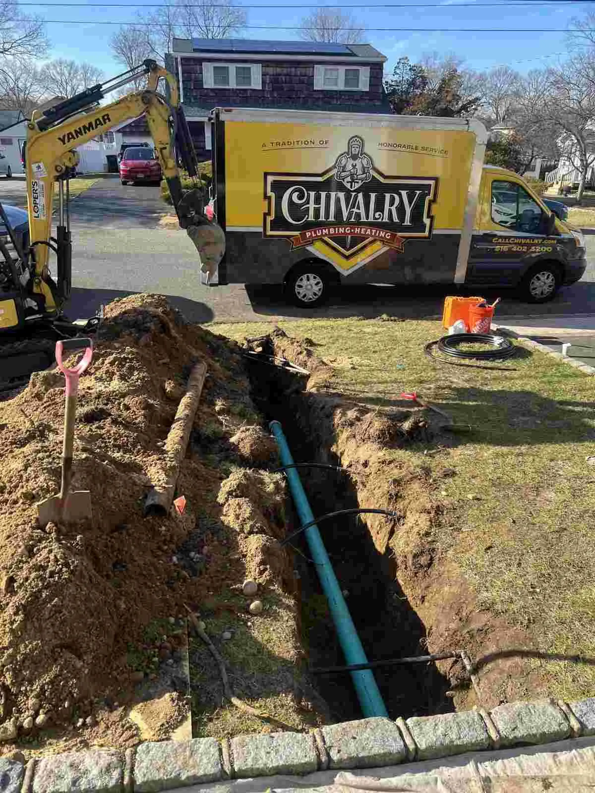 Leaking shutoff valve and nearby plumbing connection being inspected in a Dix Hills home.