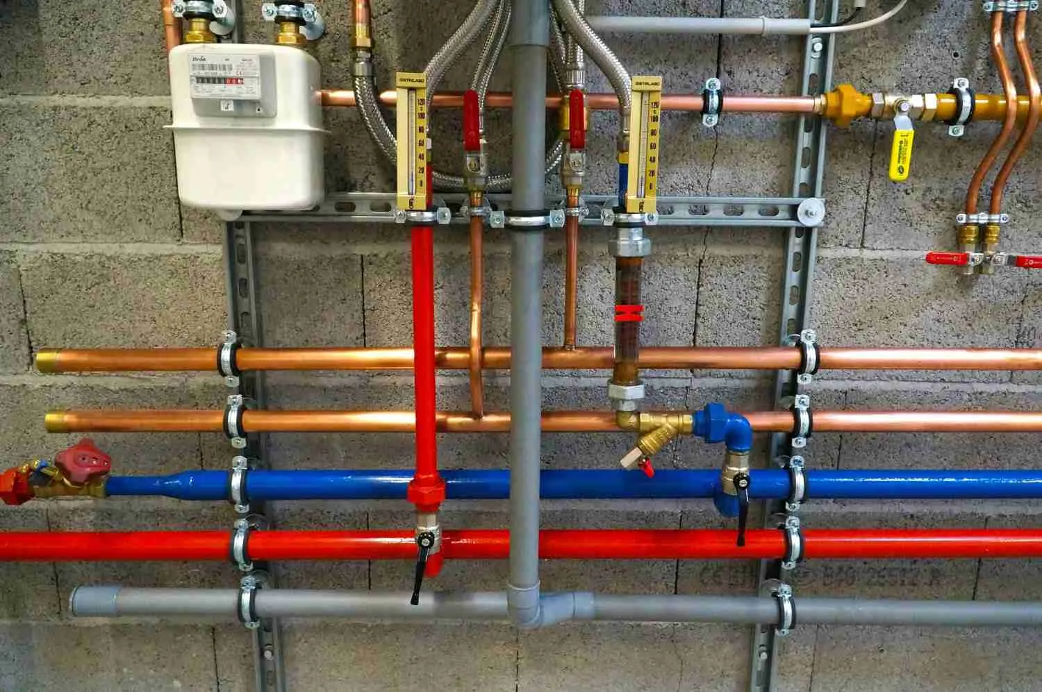 Toilet water supply line and shutoff connection being inspected in Bethpage, NY. Plumber near me